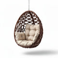 Hanging egg chair with beige cushion woven rattan design 90 x 70 x 100cm