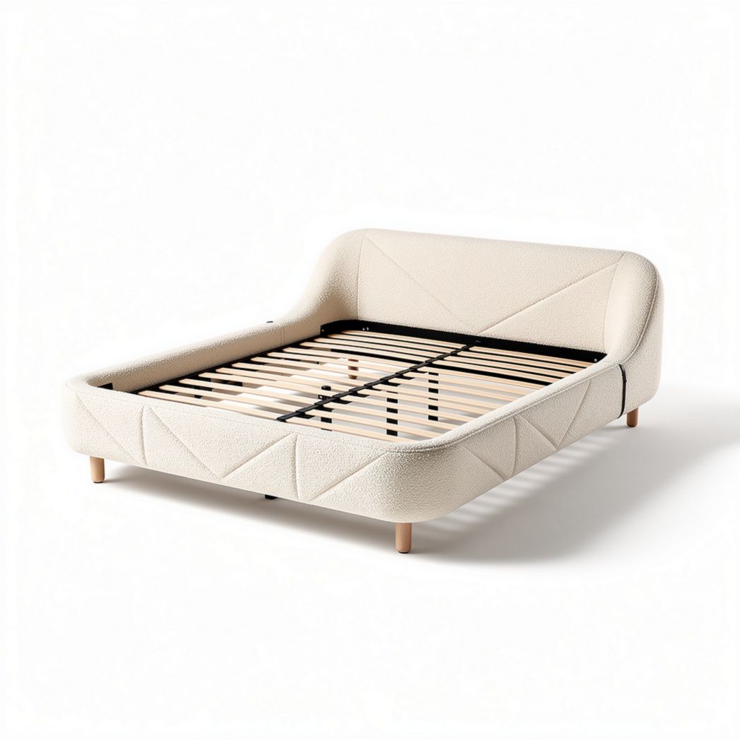 Upholstered bed frame with wooden slats and soft fabric in cream color